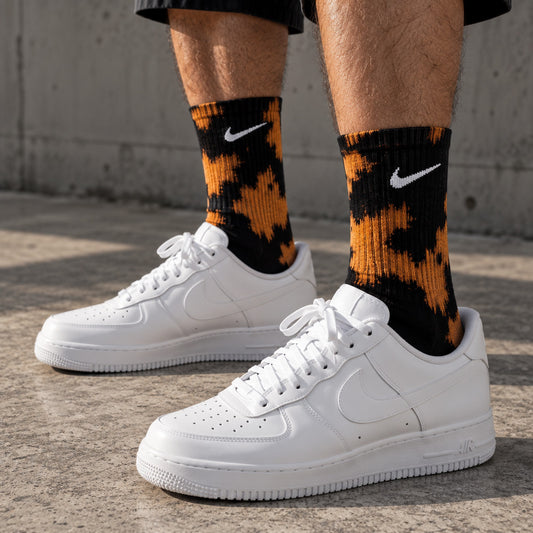 Nike Nile Fire Black worn by a male model with white sneakers - Dravo lifestyle photo