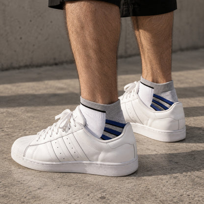 Adidas Mini Small Half Gray worn by a male model with white sneakers - Dravo lifestyle photo