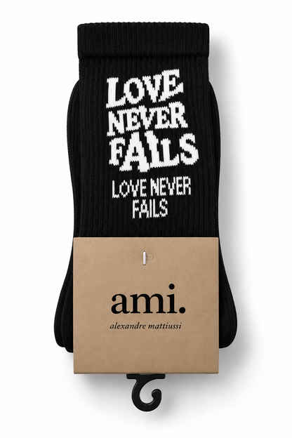 Ami Love Never Fails socks – Black, packaged