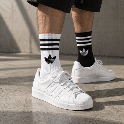 Dravo x Adidas Heritage Long worn by a male model with white sneakers - Dravo lifestyle photo