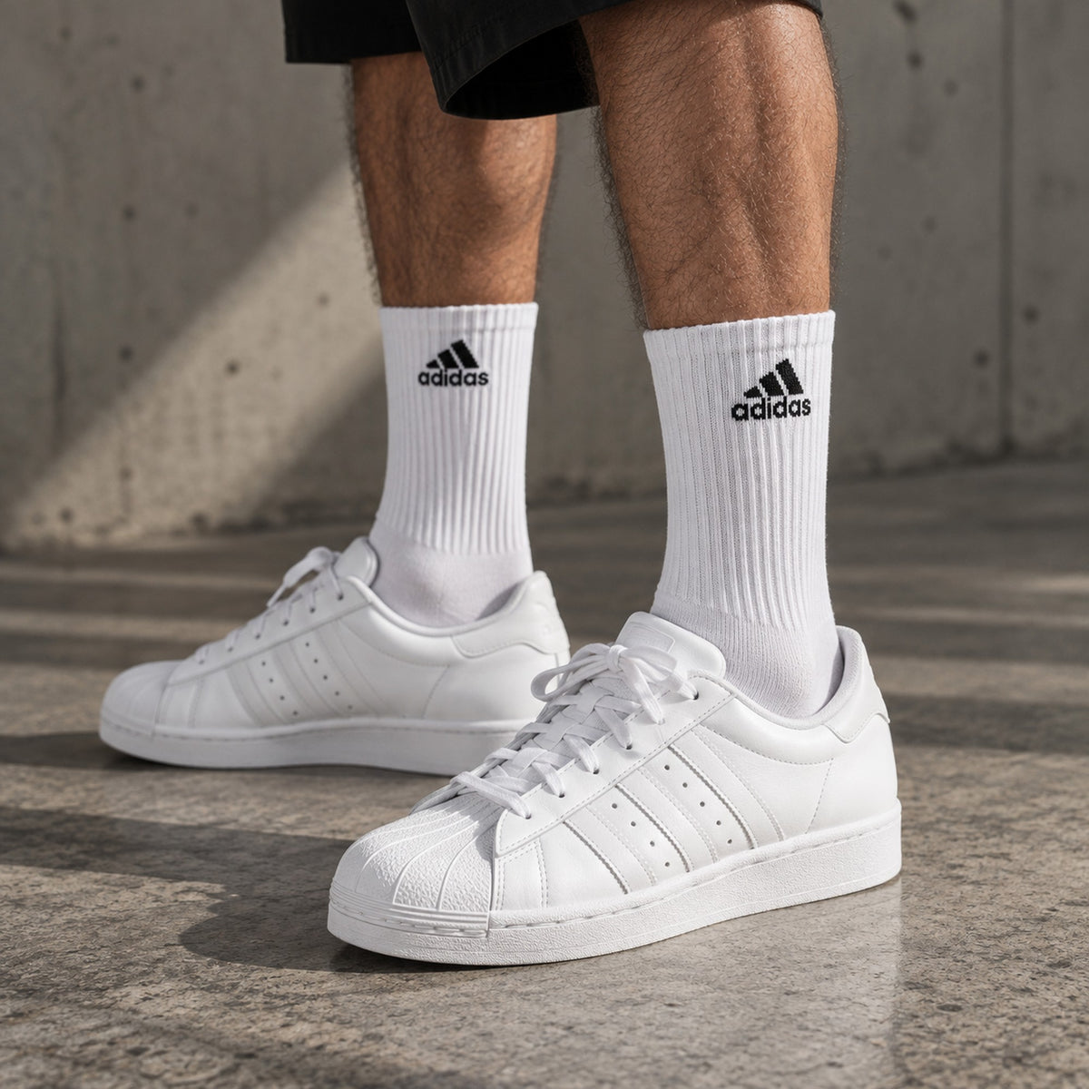 Dravo x Adidas Stealth Long worn by a male model with white sneakers - Dravo lifestyle photo