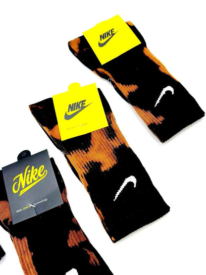 Nike Nile Fire Black – flat lay with Nike tags