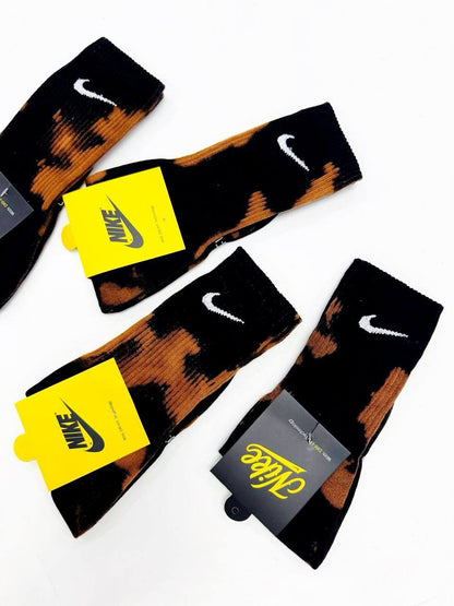 Nike Nile Fire Black – flat lay, embroidered Swoosh